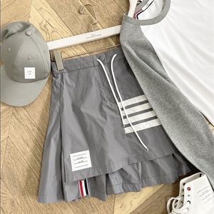 New Flyweight Tech Pleated 4-bar Mini skirt